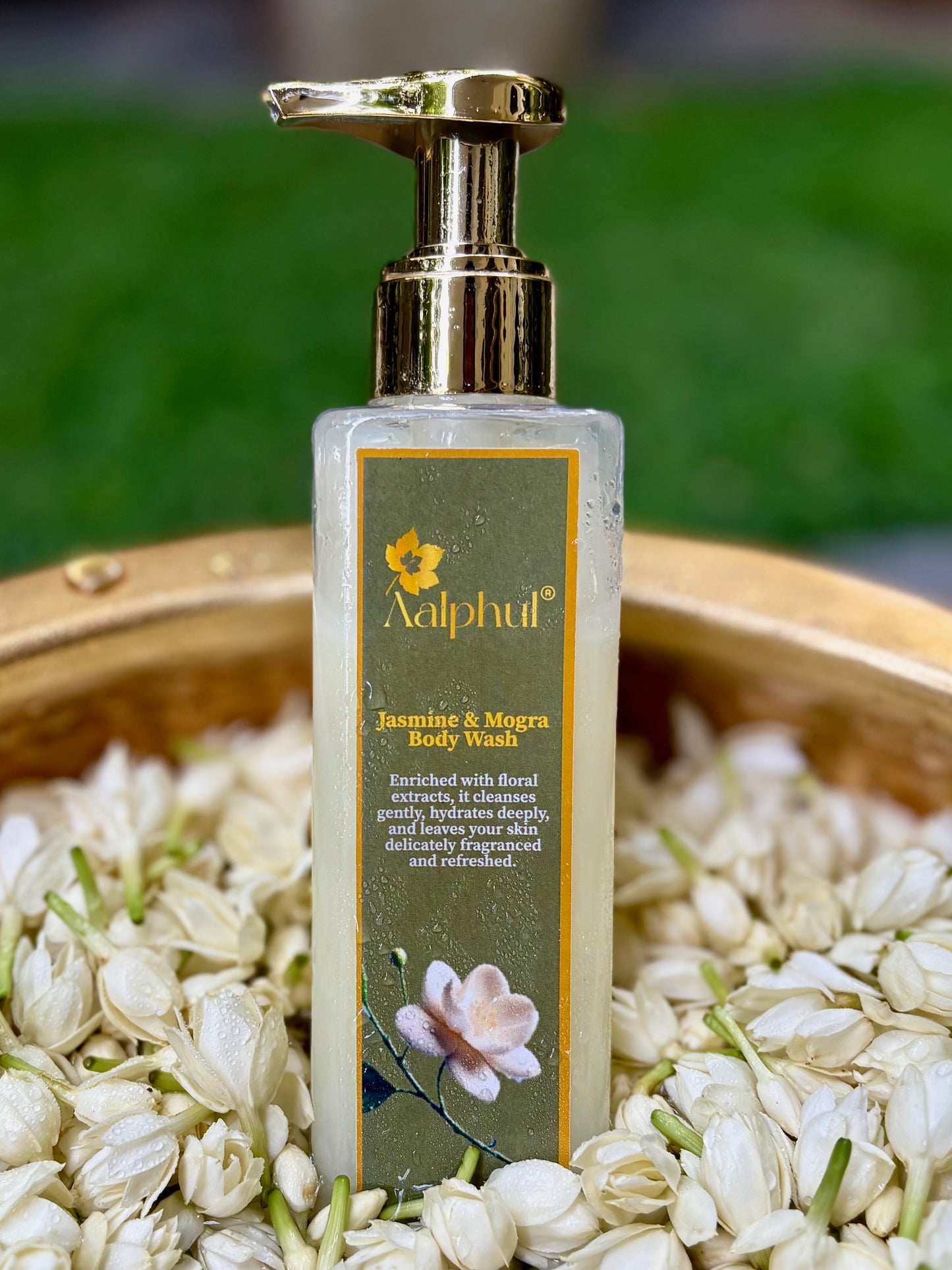 Aalphul Jasmine & Mogra Body Wash bottle in a vessel with jasmine flowers