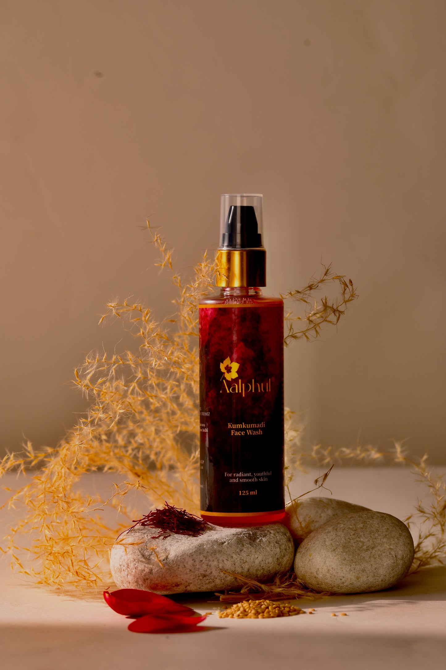 Aalphul Kumkumadi Face Wash displayed with natural herbs