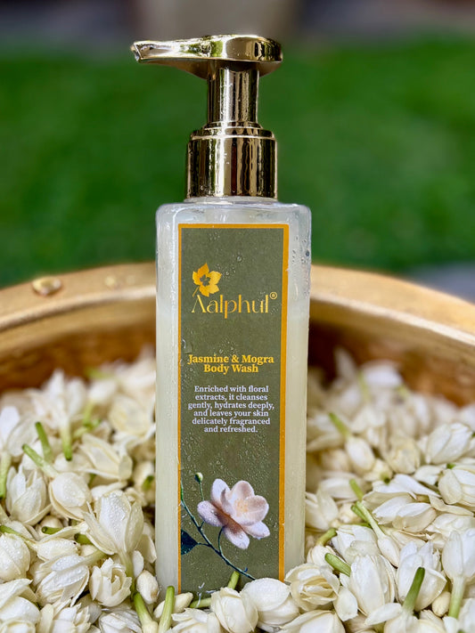 Aalphul Jasmine & Mogra Body Wash bottle in a vessel with jasmine flowers