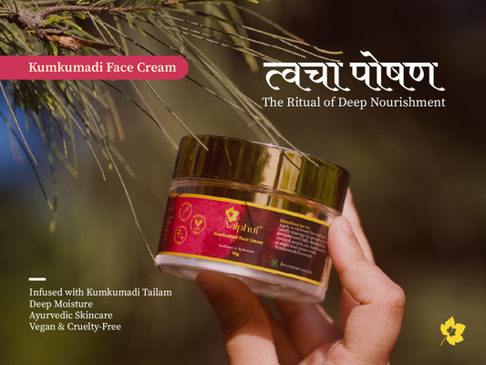Kumkumadi Face Cream jar held by a hand with a natural background