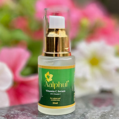 Aalphul Vitamin C Serum bottle with a floral background
