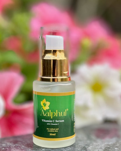 Aalphul Vitamin C Serum 30ml bottle in a beautiful setting
