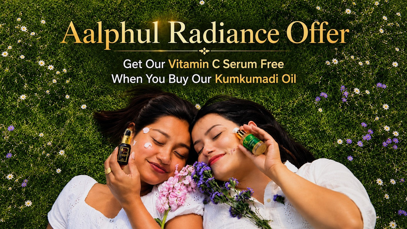 Aalphul promotional banner showing two women lying on a flower-filled green meadow holding Kumkumadi Oil and Vitamin C Serum. The image advertises a special offer: get a free Vitamin C Serum with the purchase of Aalphul Kumkumadi Oil, highlighting natural skincare and radiant glowing skin.