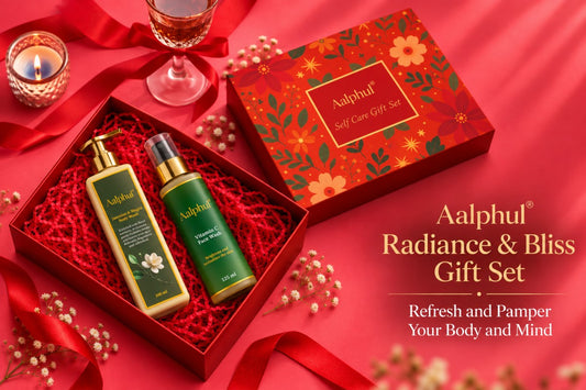 Aalphul Radiance & Bliss Gift Set featuring the Jasmine & Mogra Body Wash and the Vitamin C Face Wash in an attractive red gift box, alongside the red floral gift box lid and decorative red ribbons on a red background.